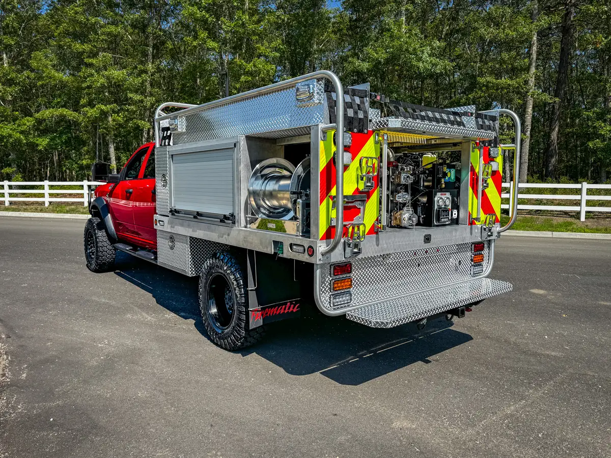 Straight rear exterior view showing chevron panel and rear pump assembly.